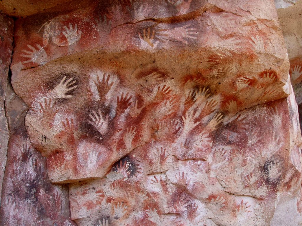 Hands at the Cuevas de las Manos upon Río Pinturas, near the town of Perito Moreno in Santa Cruz Province, Argentina. Picture taken by me in 2005.