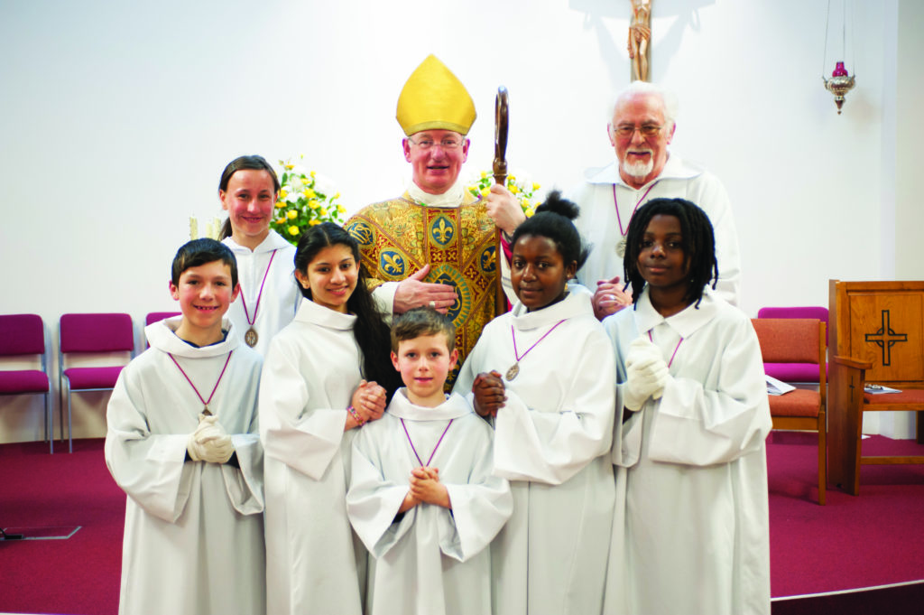 St Wilfrid's Church dedication. Bishop Richard with Altar Servers. Photograph by Diocese of Arundel and Brighton