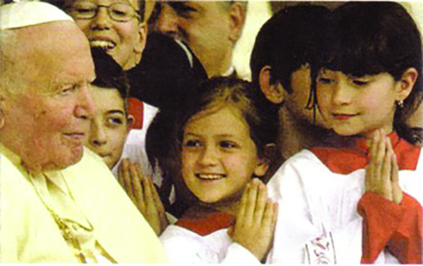 Pope John Paul II with altar girls. Photograph by Kurt20008