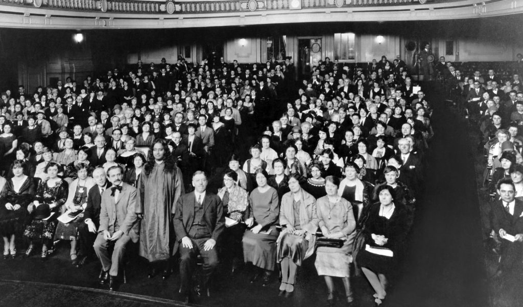 Paramahansa Yogananda with audience members during a lecture series in New York City in the 1920s.